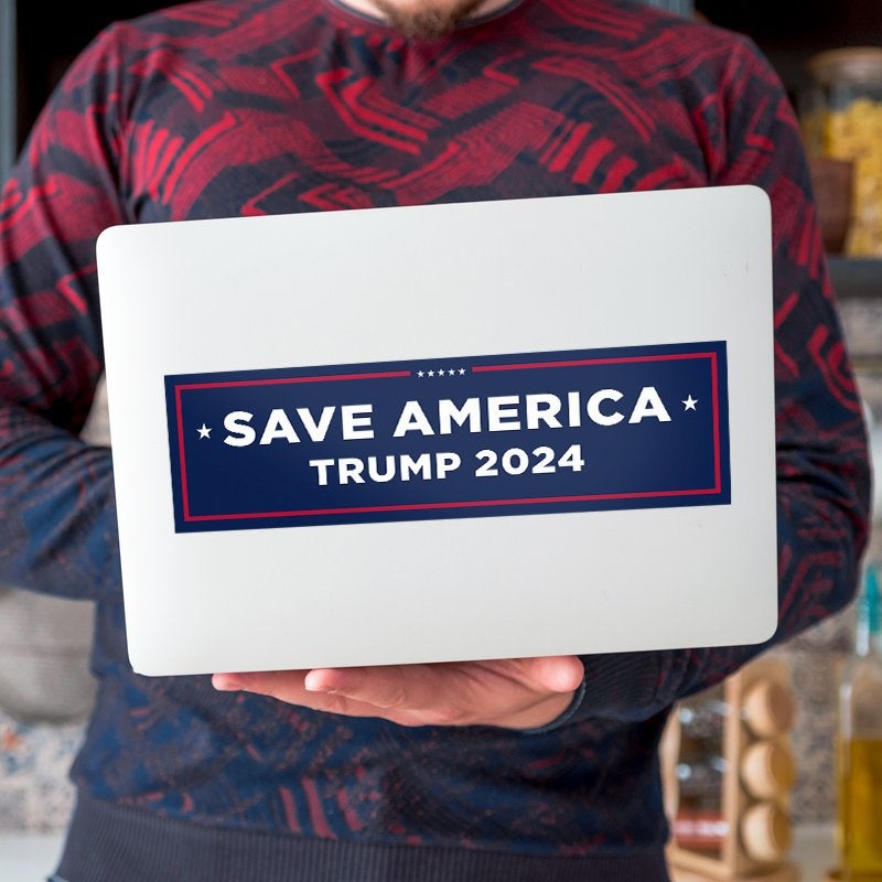 Save America Bumper Sticker on a laptop