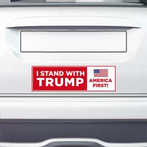 I Stand with Trump Bumper Sticker on the bumper of a white car