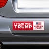 I Stand with Trump Bumper Sticker on the bumper of a gray car