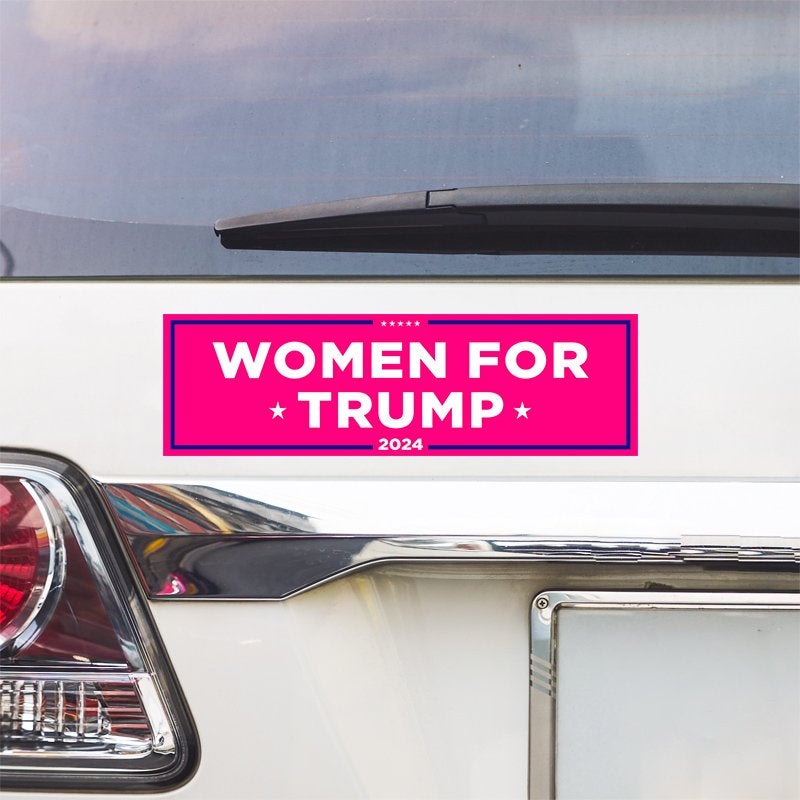 Women for Trump Bumper Sticker above a white car's tail light