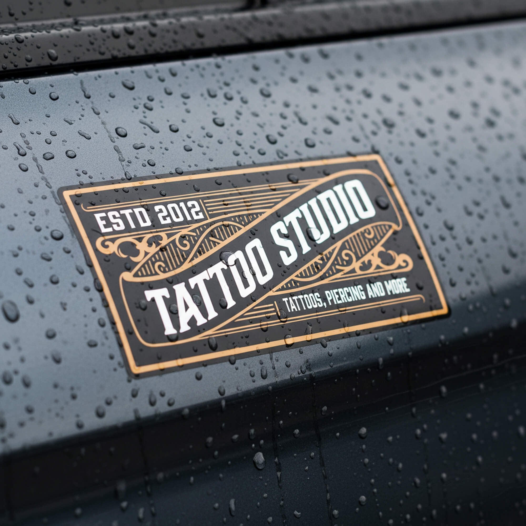 Tattoo shop 1x2 vinyl sticker on a black car