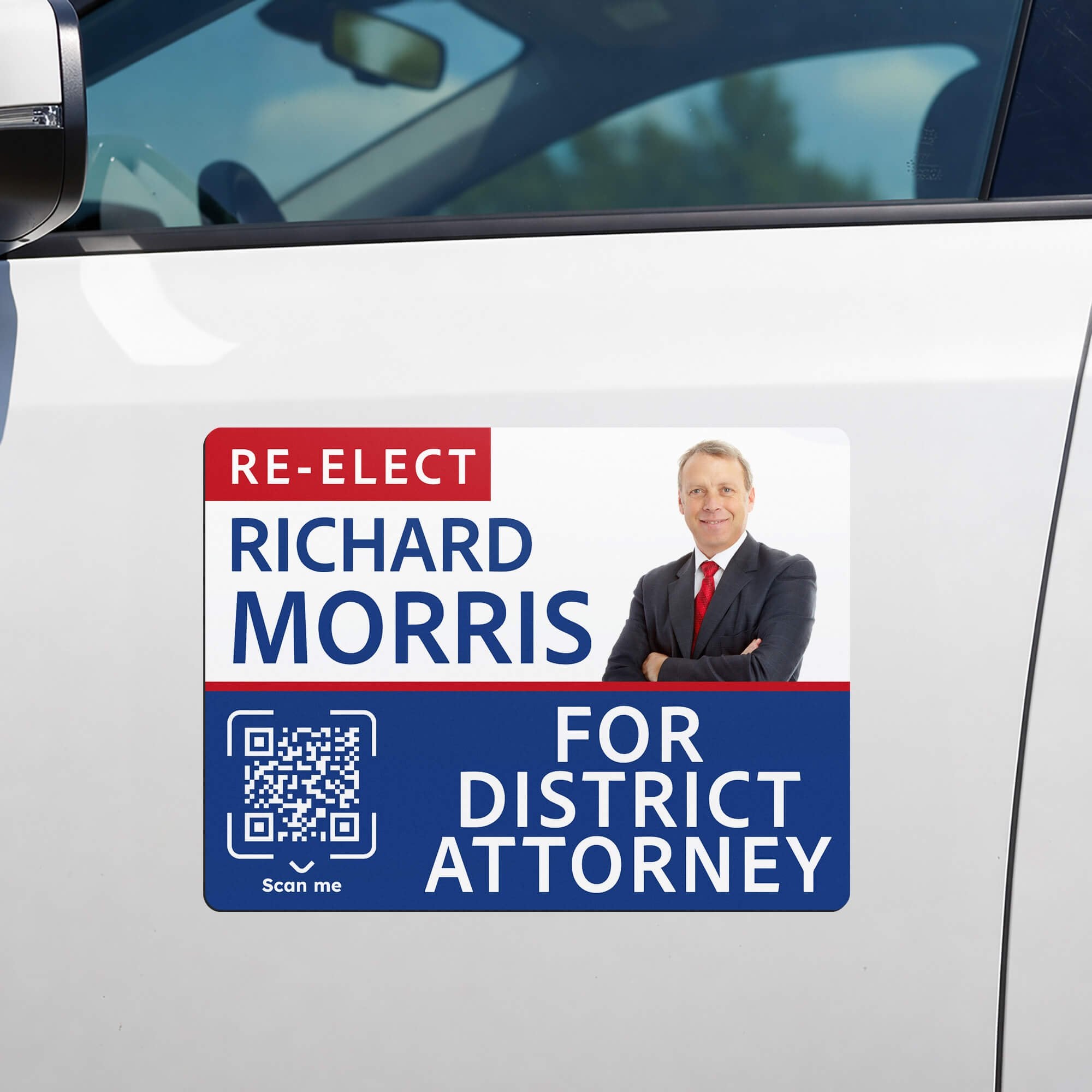 A custom car magnet for a politician on a white car