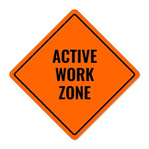 Orange aluminum sign with the message of an active work zone