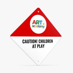 An angled view of a red and white split design on a diamond aluminum sign with an art academy logo