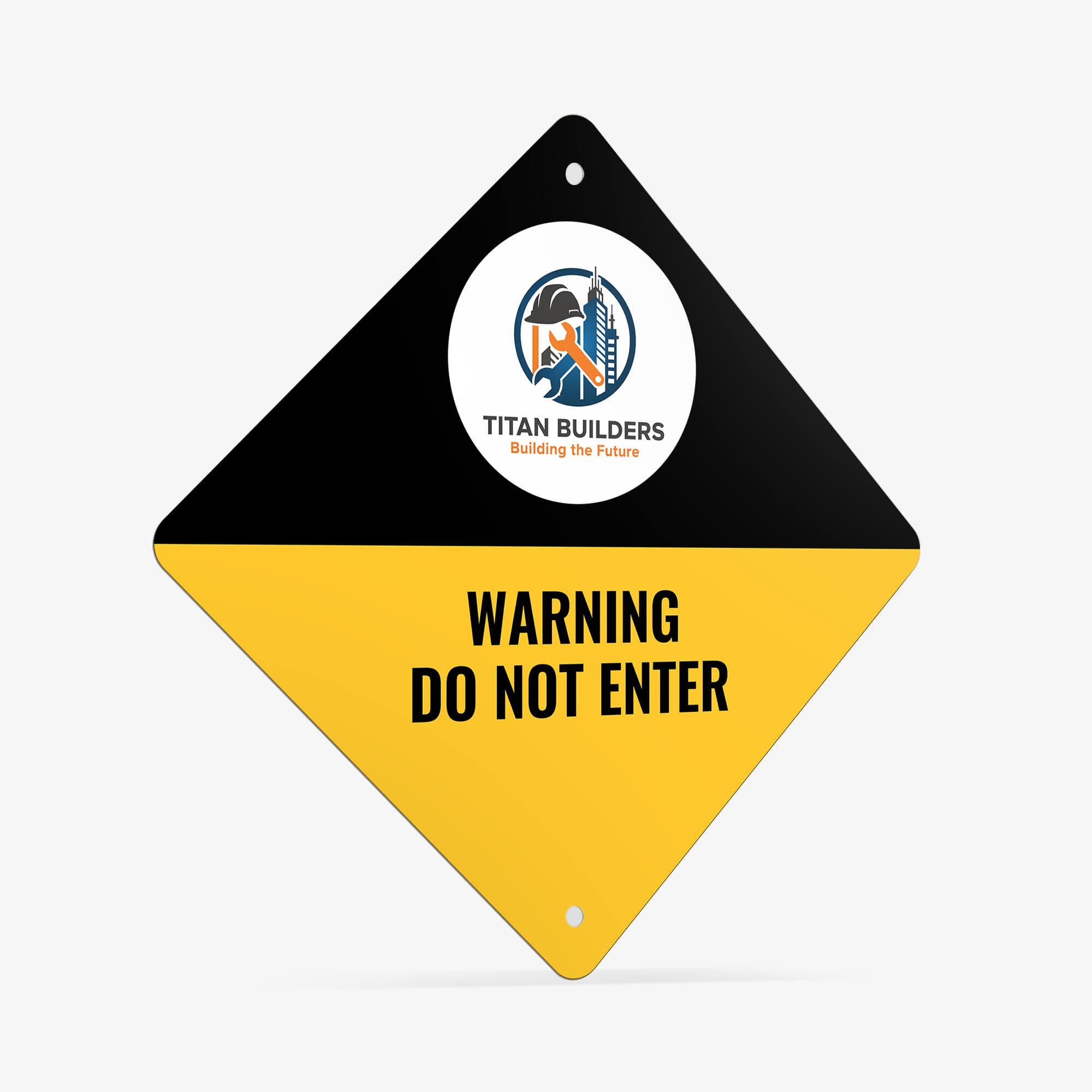 An angled view of a black and yellow split design on a diamond aluminum sign with a construction company logo