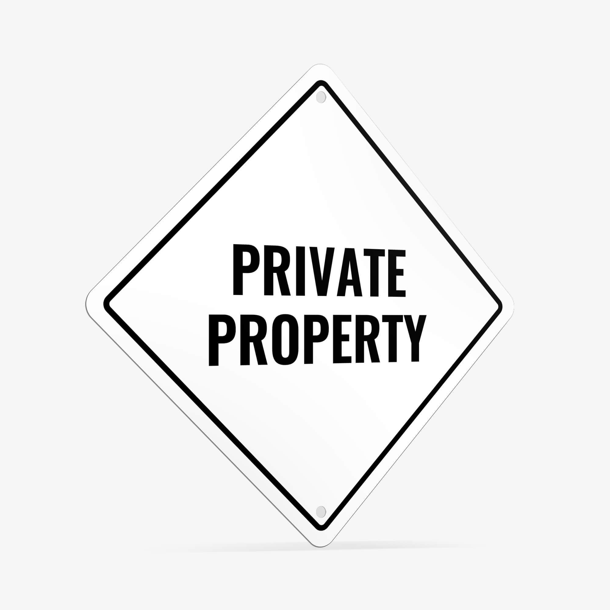 A white diamond aluminum sign with the message PRIVATE PROPERTY