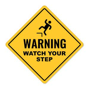 A custom yellow diamond sign with a warning and an icon