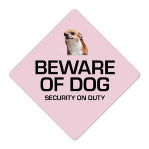 A custom pink diamond sign with a beware of dog message and a funny dog image