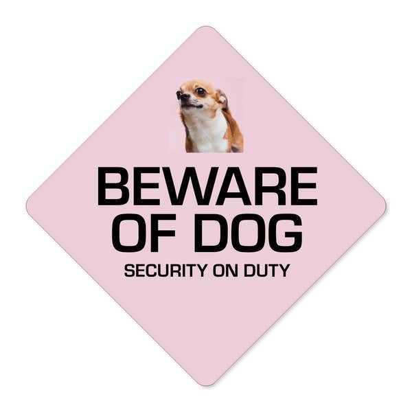 A custom pink diamond sign with a beware of dog message and a funny dog image