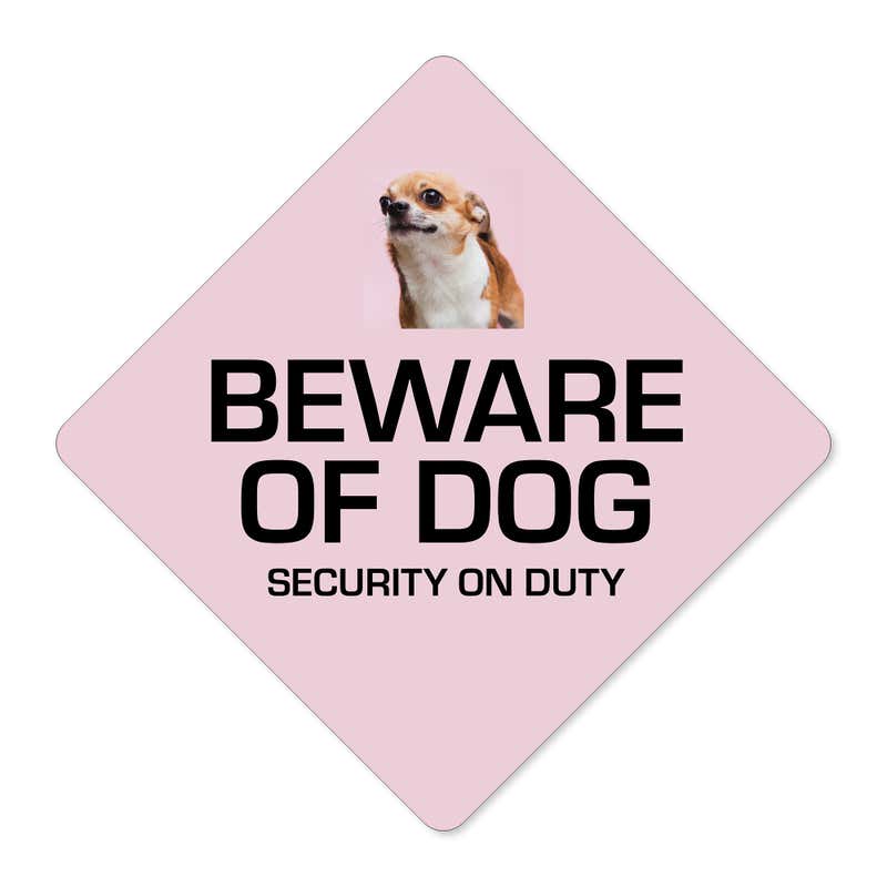A custom pink diamond sign with a beware of dog message and a funny dog image