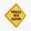 A yellow diamond sign with the message PROCEED WITH CAUTION