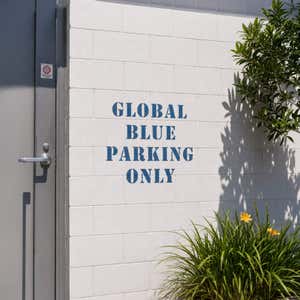 A parking space marked using a stencil
