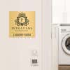 6x6 custom engraved brass sign displayed for a laundry room