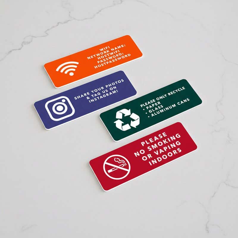 4 different designs of the 1x3 engraved plastic sign for an Airbnb house