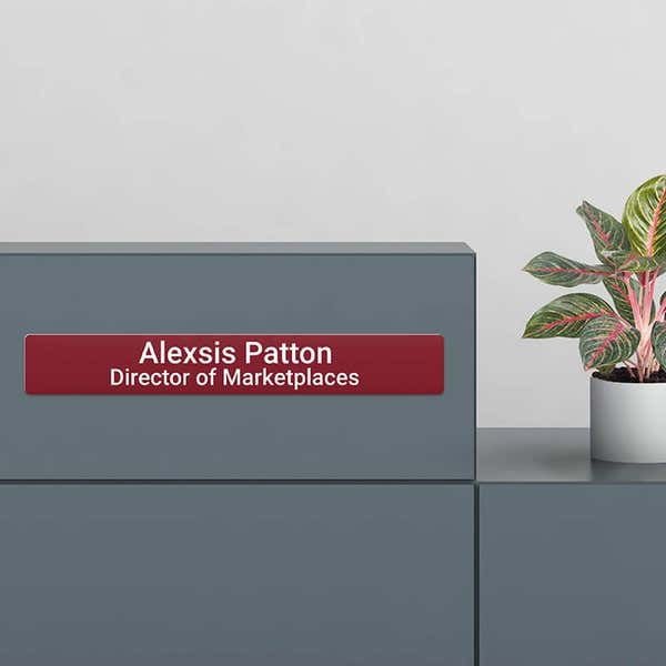 2x14 plastic sign as a name plate at a desk