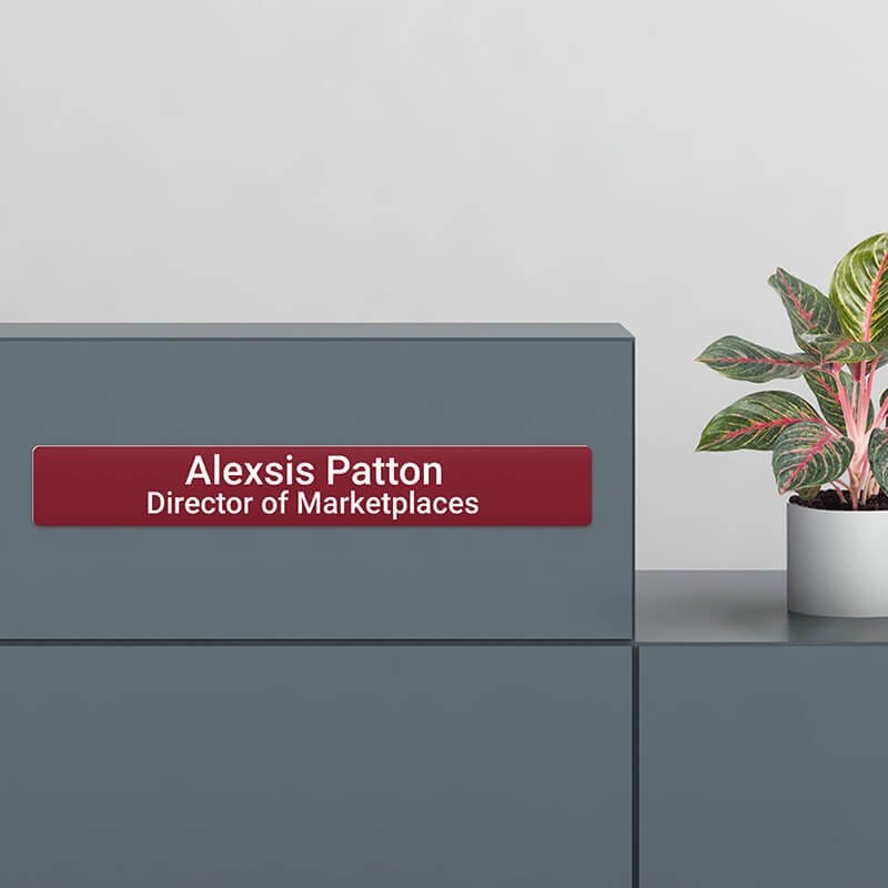 2x14 plastic sign as a name plate at a desk