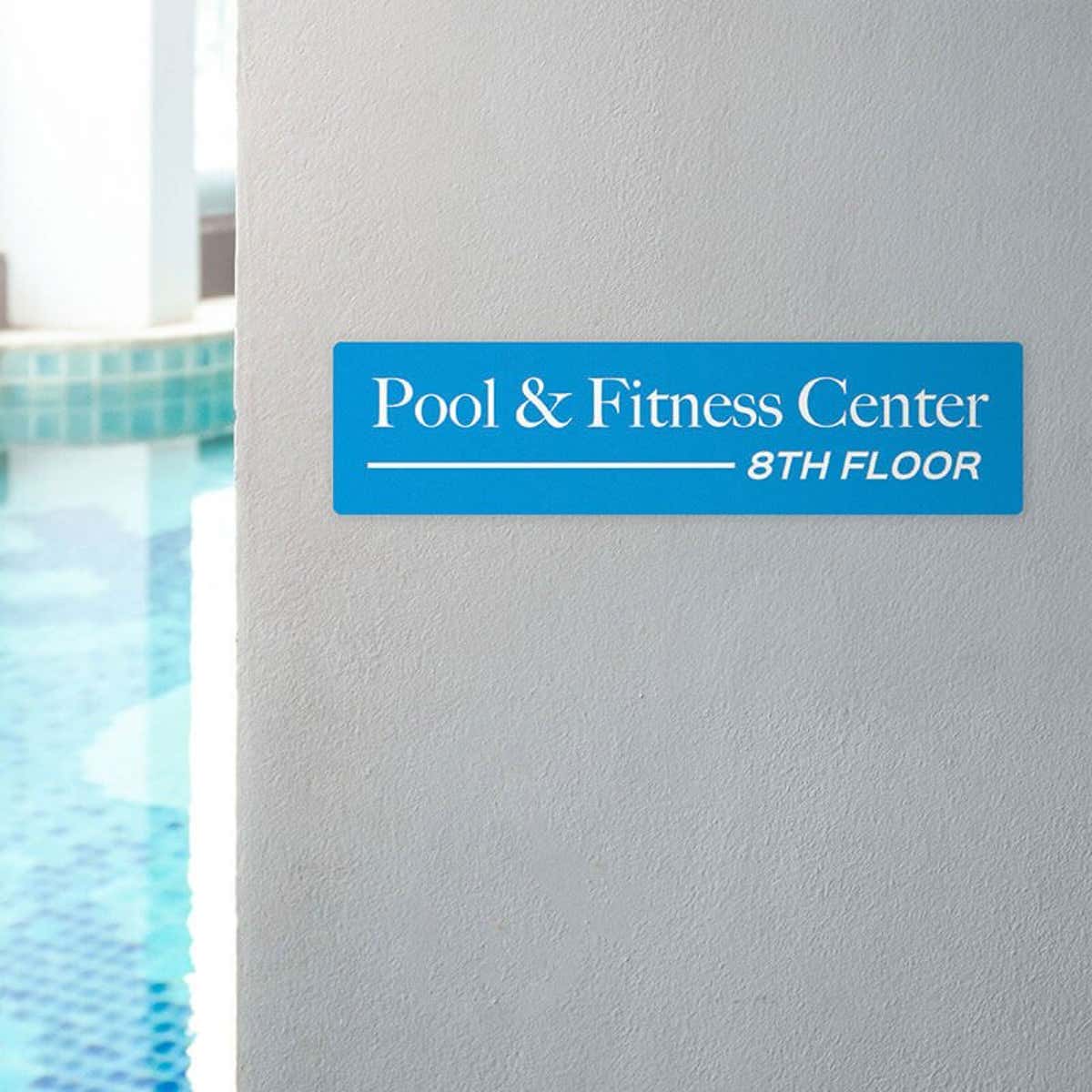 Engraved plastic sign for a pool and fitness center