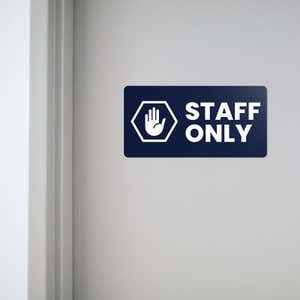 Engraved plastic sign for a staff only entrance