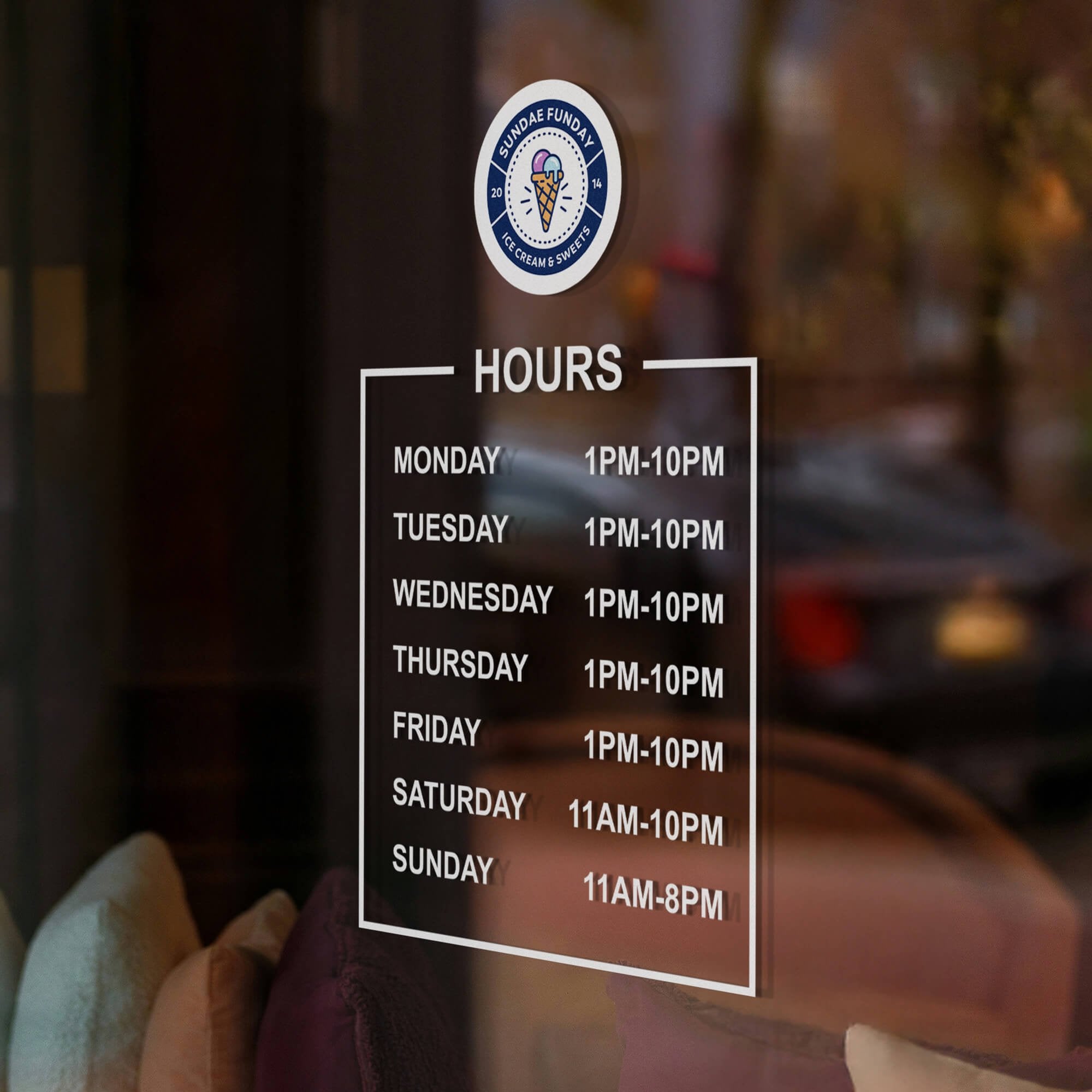 Custom business hours decal on the window of an ice cream shop 