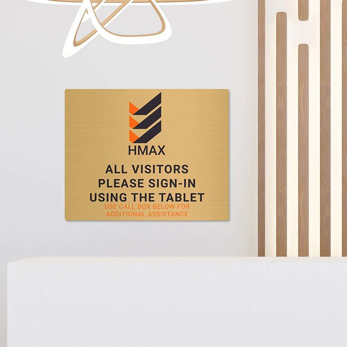 8x10 printed brass sign displayed in a waiting room