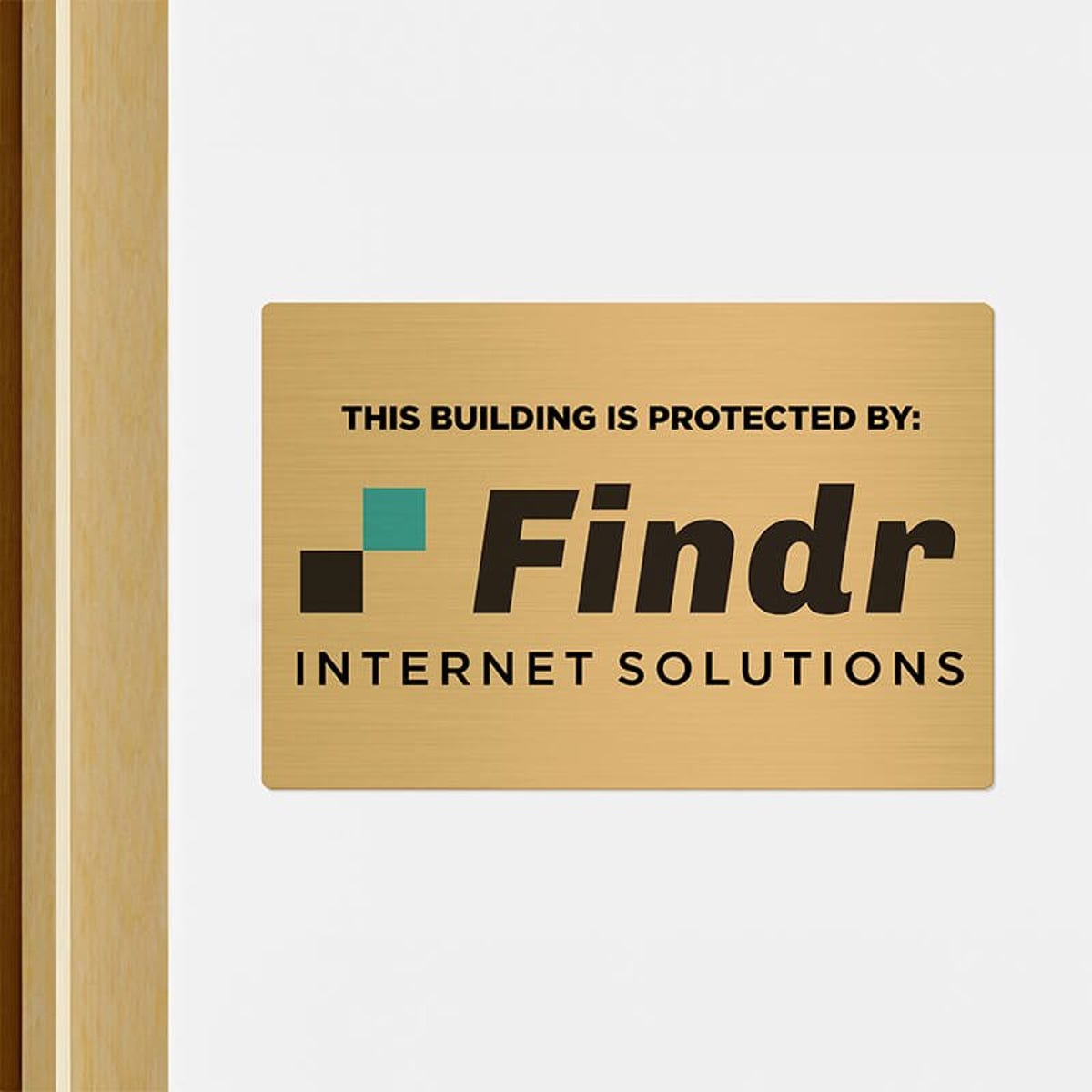8x12 printed brass sign displayed by a doorway