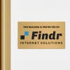 8x14 printed brass sign displayed in a doorway