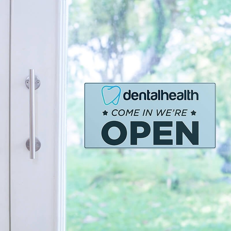 An open sign for a dental health office