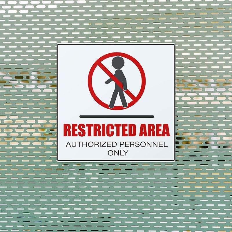 A plastic sign for a restricted area