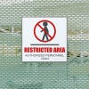 A plastic sign for a restricted area