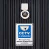 A plastic sign below a CCTV to inform that the CCVT is always recording