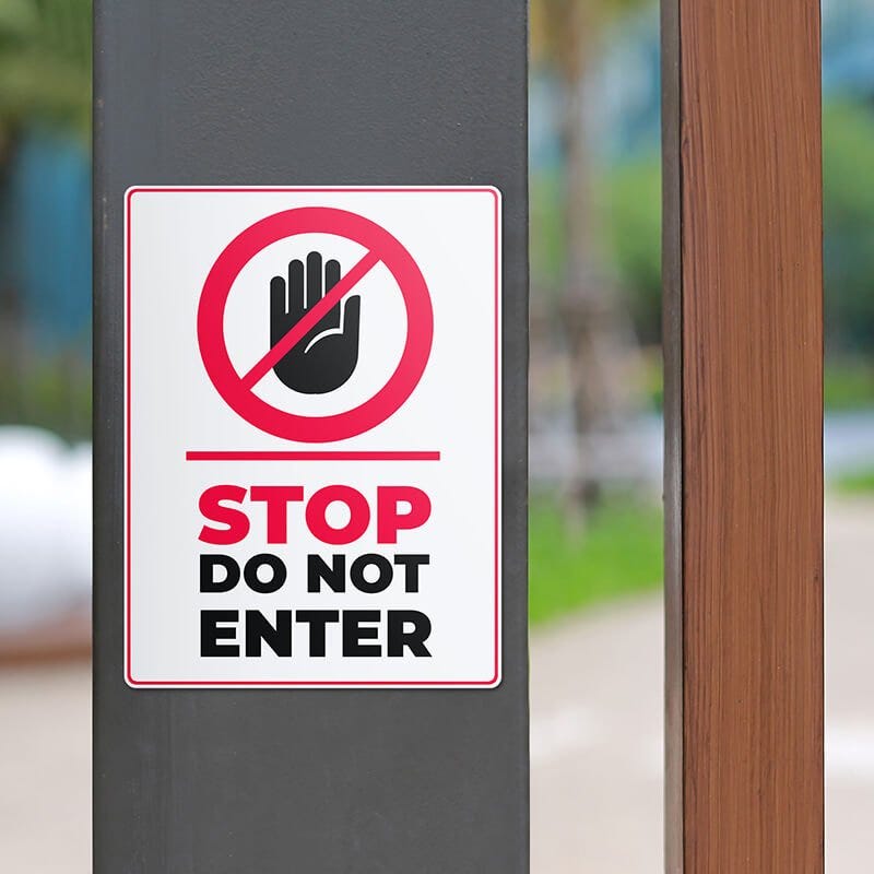 4" x 3" custom plastic sign posted on a pillar