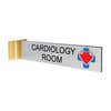 2” x 10” Corridor sign with silver material color, black engraved text, logo, and gold holder on a white background with custom text saying “CARDIOLOGY ROOM”.