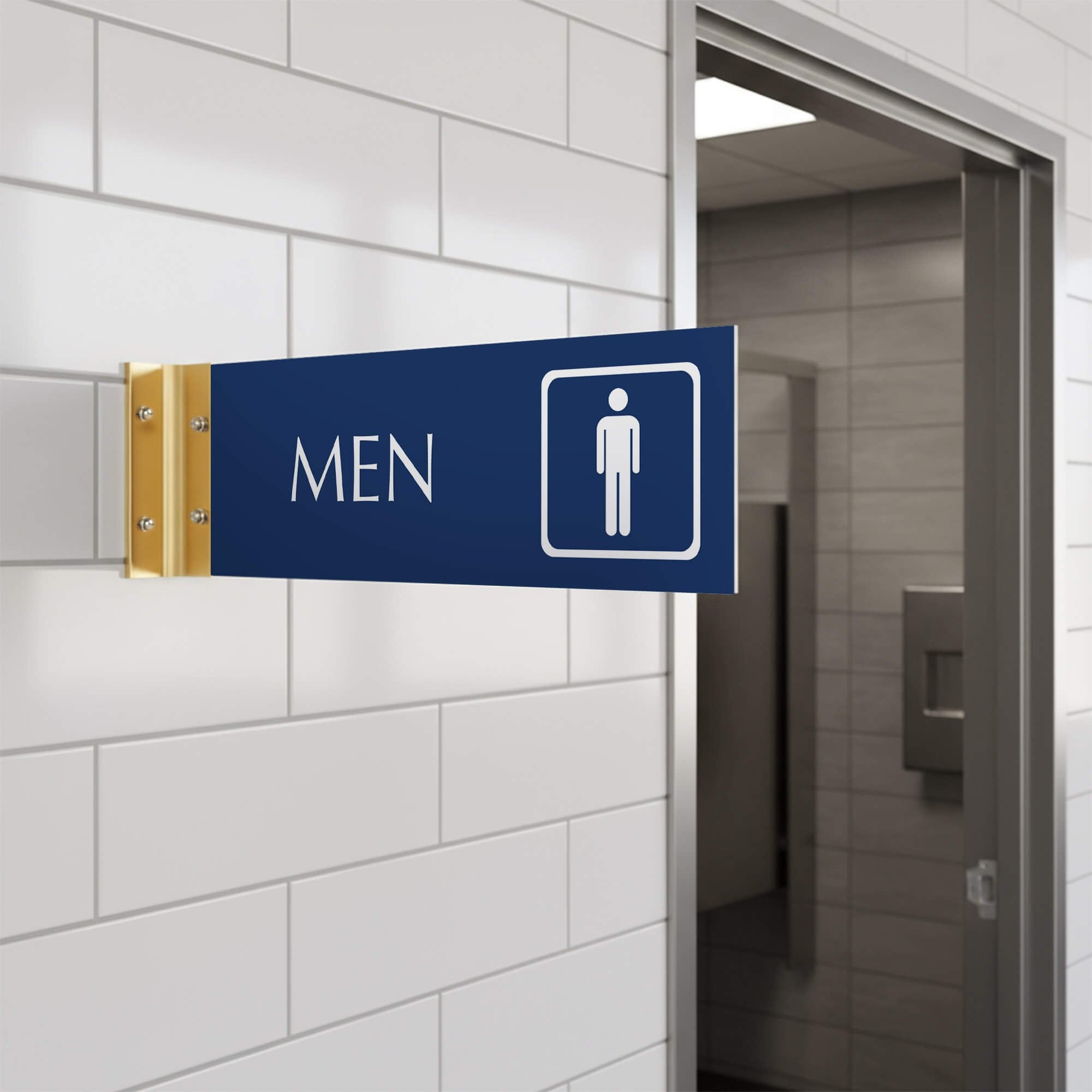 4” x 12” Corridor sign with royal blue material color, white engraved text, logo and gold holder on a hallway wall with text saying “MEN”.