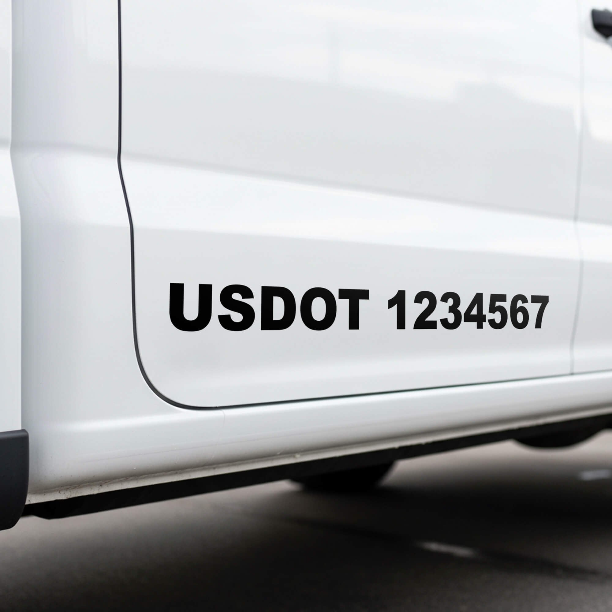 USDOT vinyl decal on the side of a white truck USDOT vinyl decal on the side of a white truck