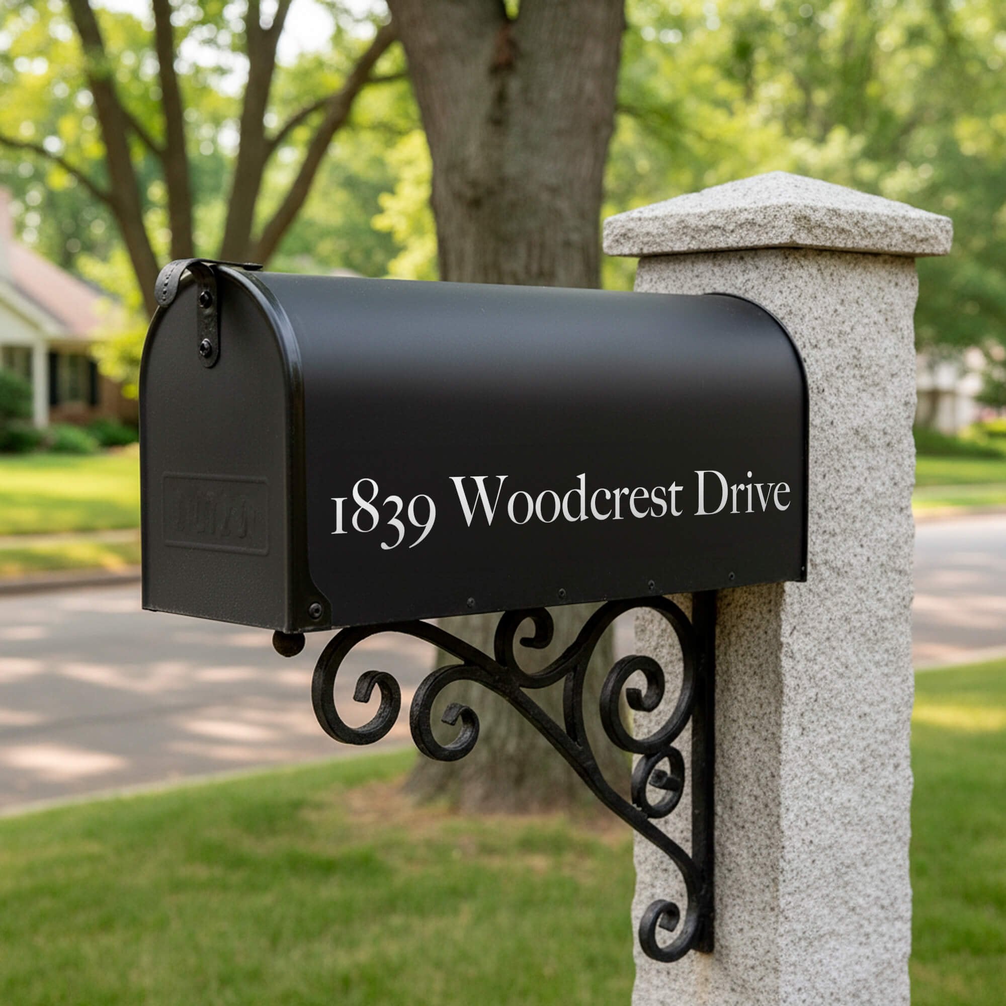 Vinyl lettering of an address on a mailbox 