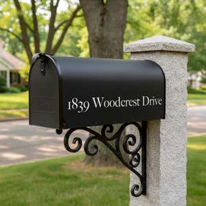 Vinyl lettering of an address on a mailbox 