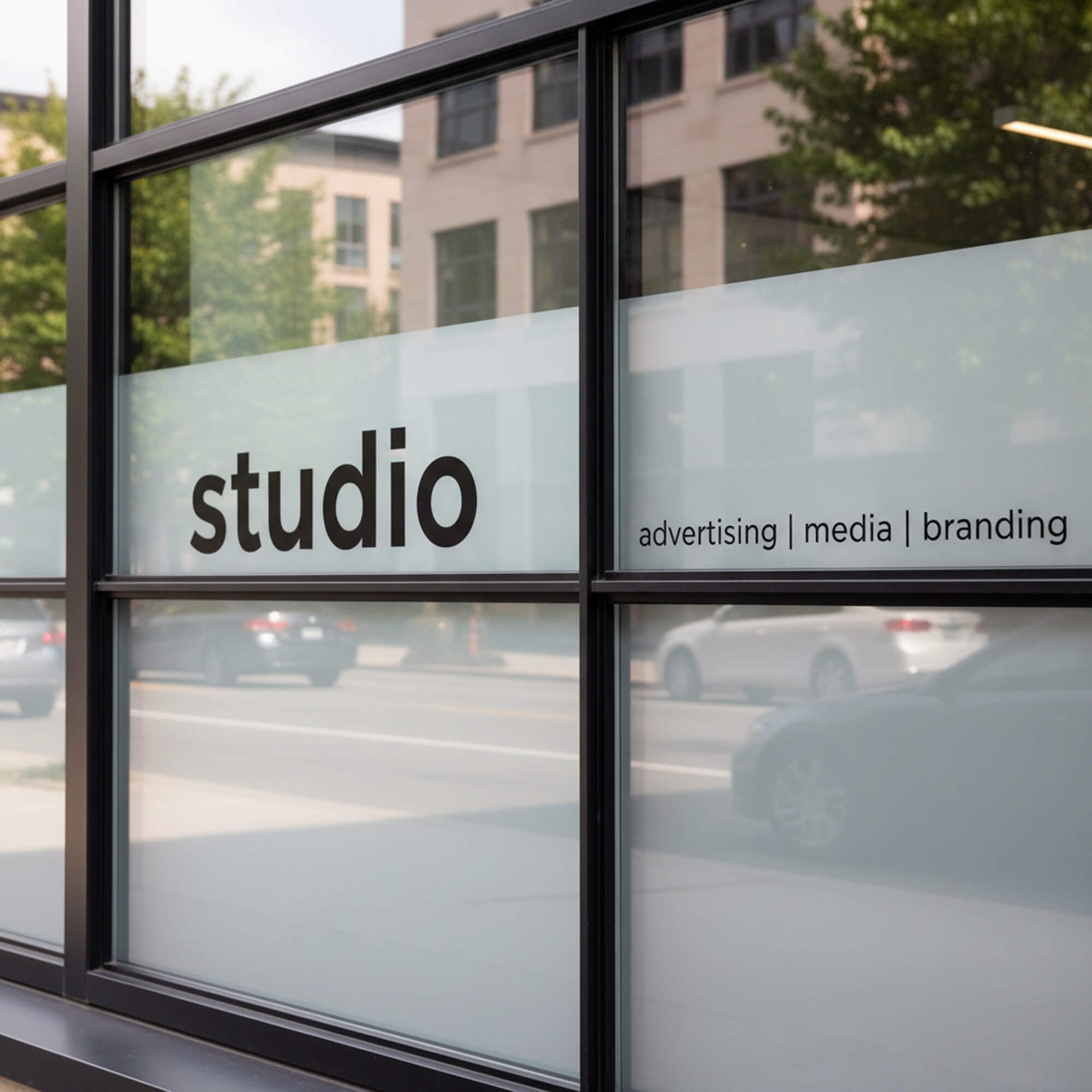 Vinyl lettering on the outside of a building for a studio