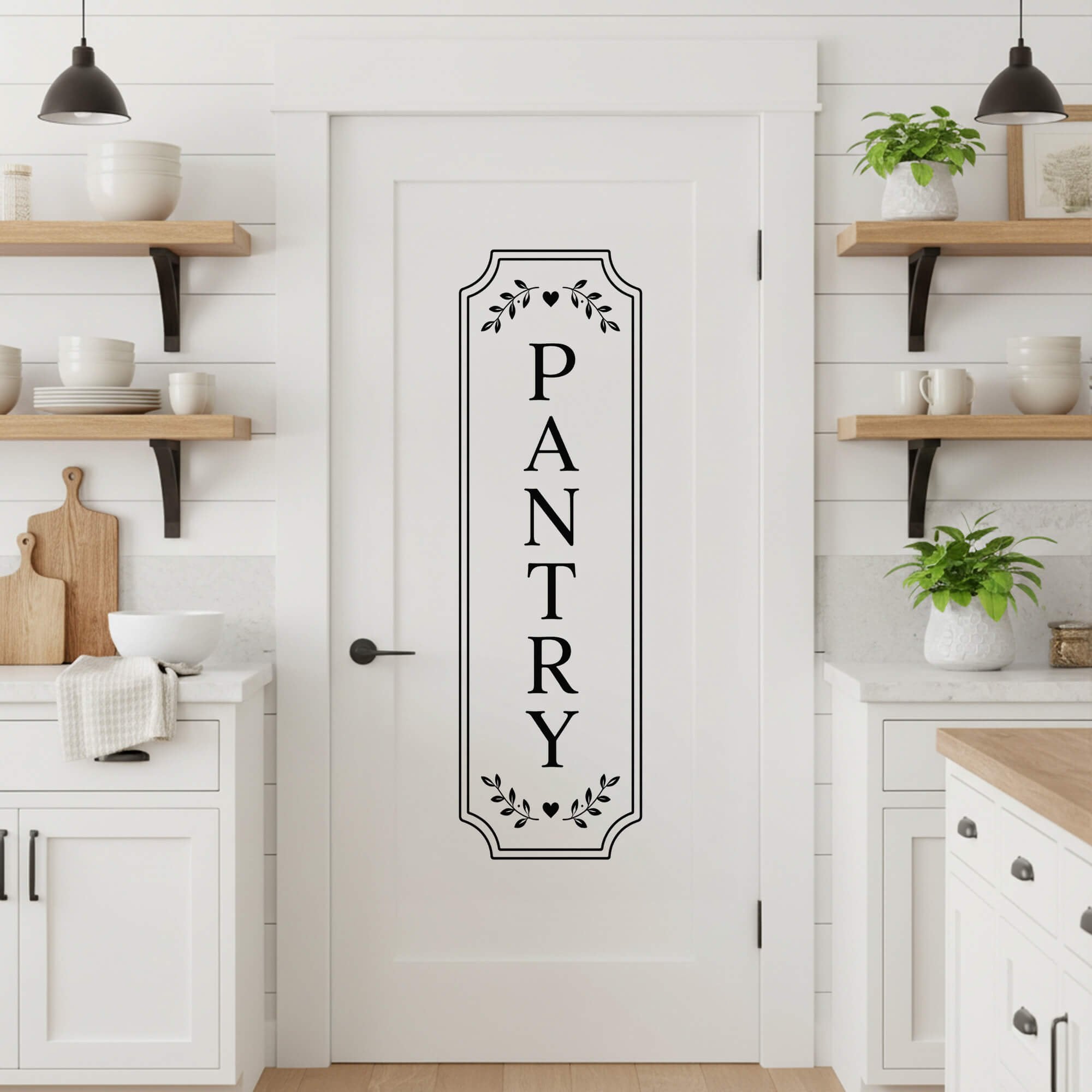 A large black die cut sticker on a door to label the pantry