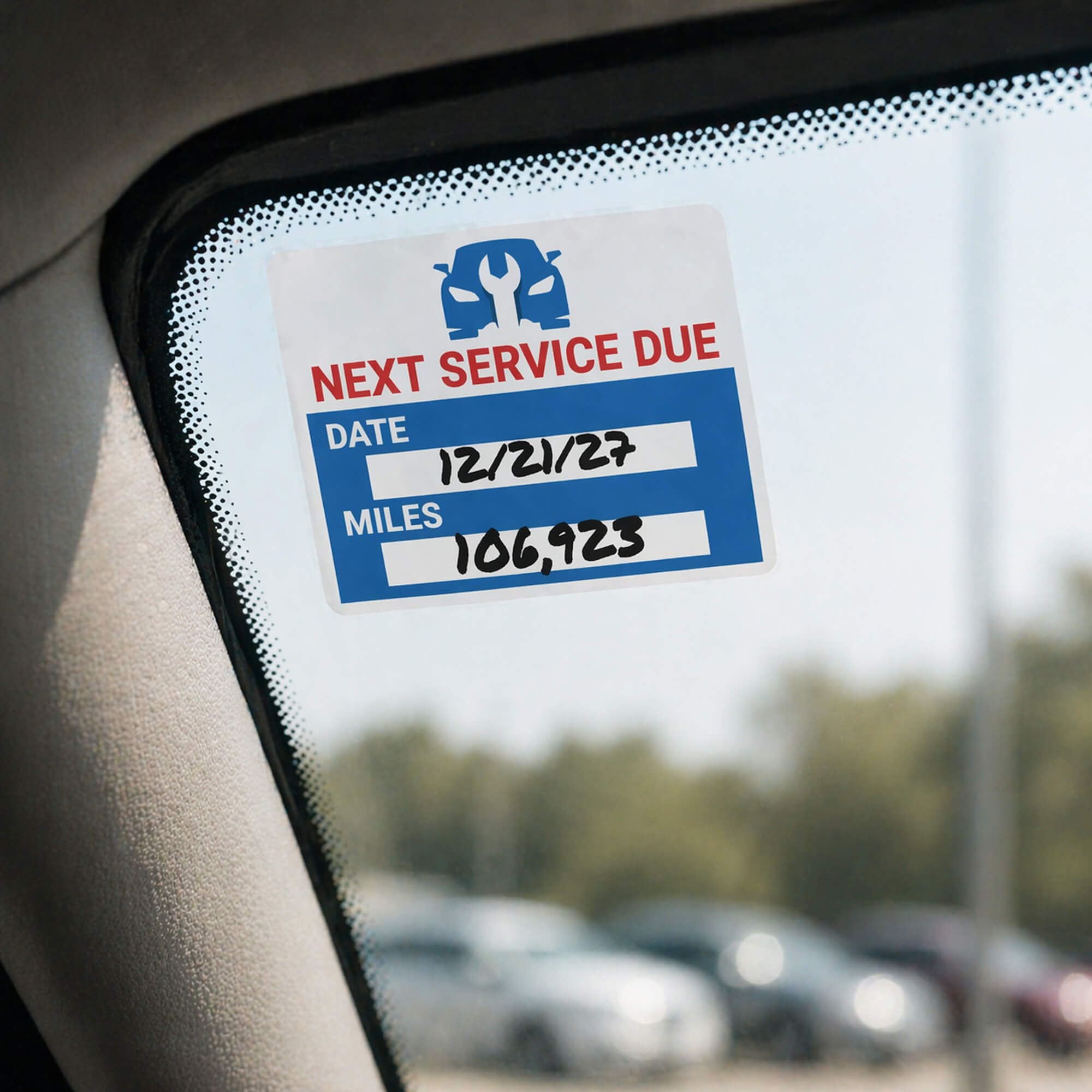 A window cling for oil service on a car