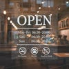 A static window cling on the storefront window for the open hours and additional rules