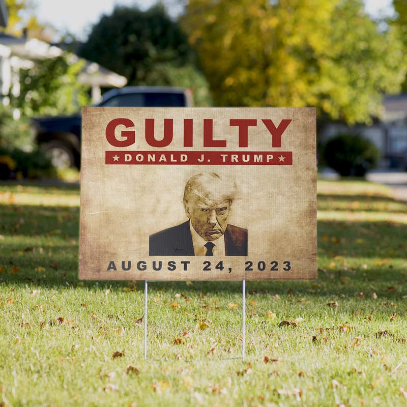 Trump Mug Shot Yard Sign in a Yard