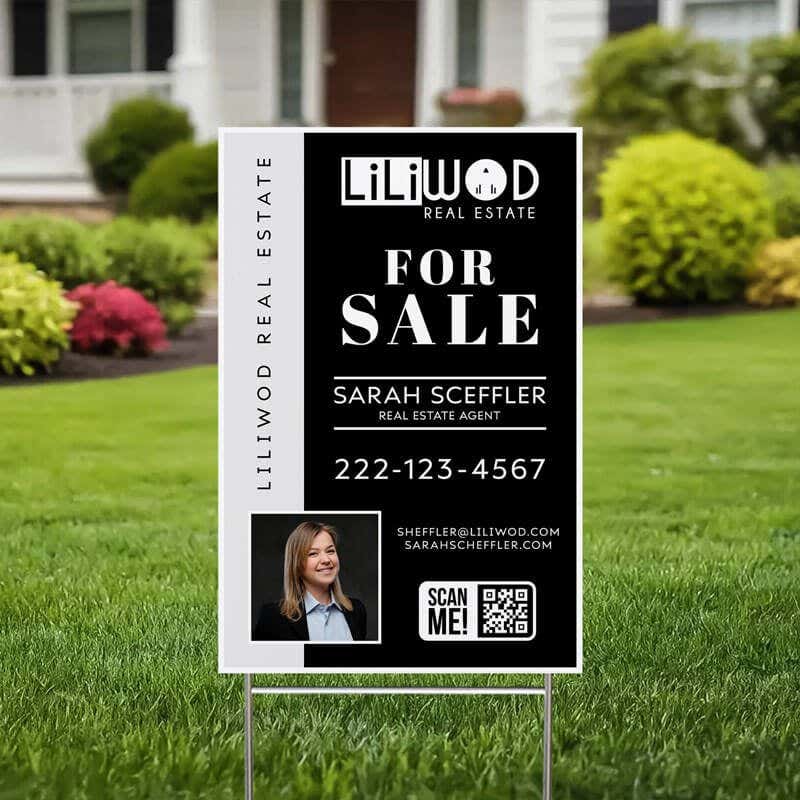 An 18x12 vertical yard sign for a realtor in a yard