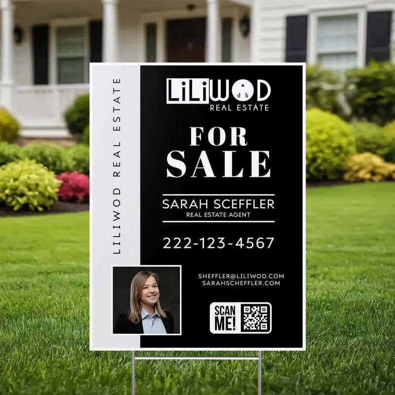 A 24x18 vertical yard sign for a realtor in a yard
