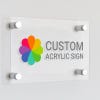 Large horizontal custom acrylic signs with a colorful logo
