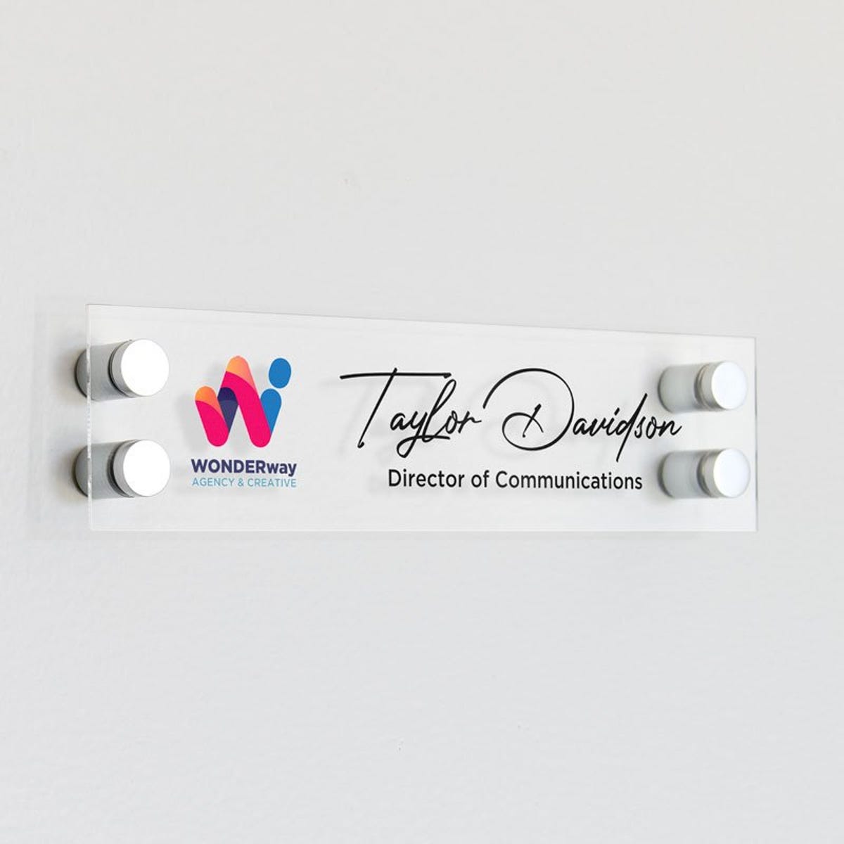 Custom clear acrylic sign with a logo and a name