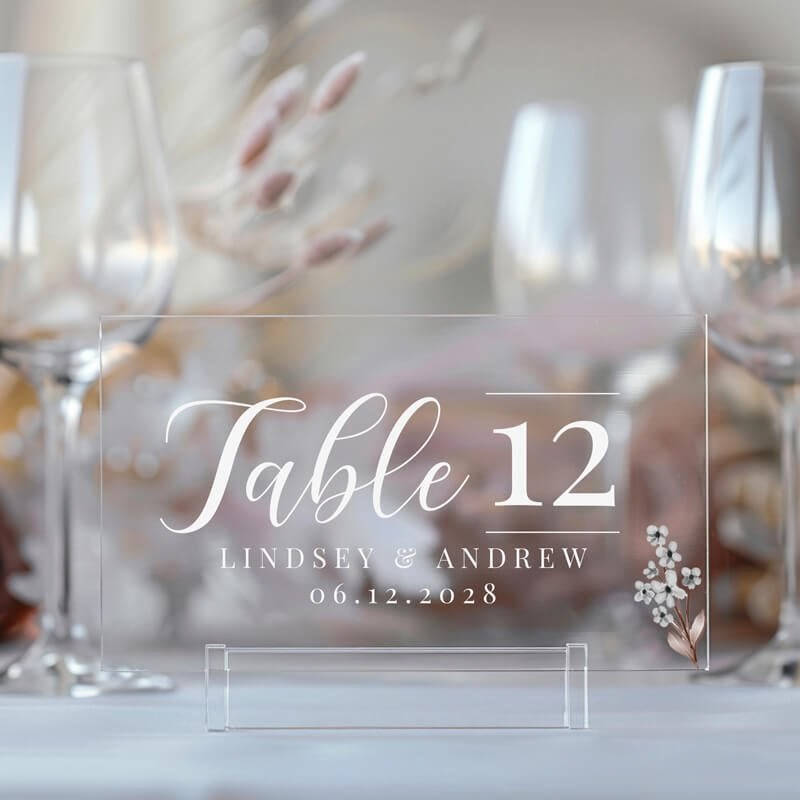 A small acrylic wedding sign to label a table number