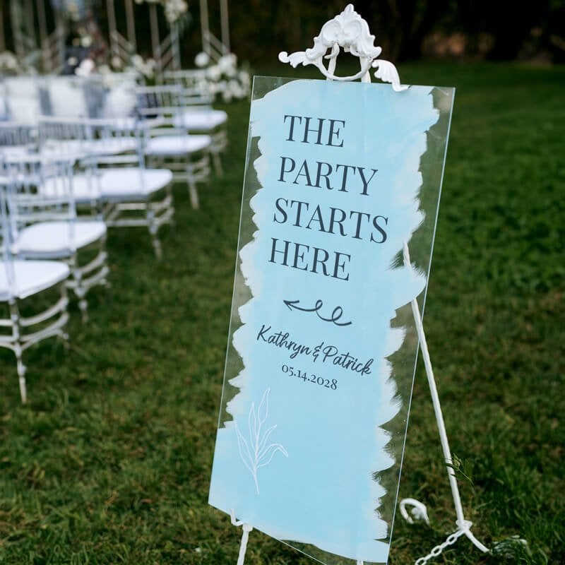 A large acrylic sign by the seating to welcome guests
