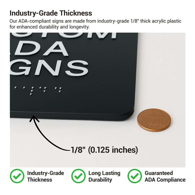 The 1/8th-inch thickness of the ADA sign compared to a penny