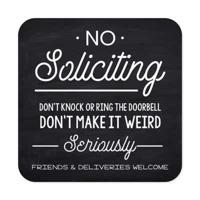 Black No soliciting sign that reads “Don’t knock or ring the doorbell…. friends & deliveries welcome” in white