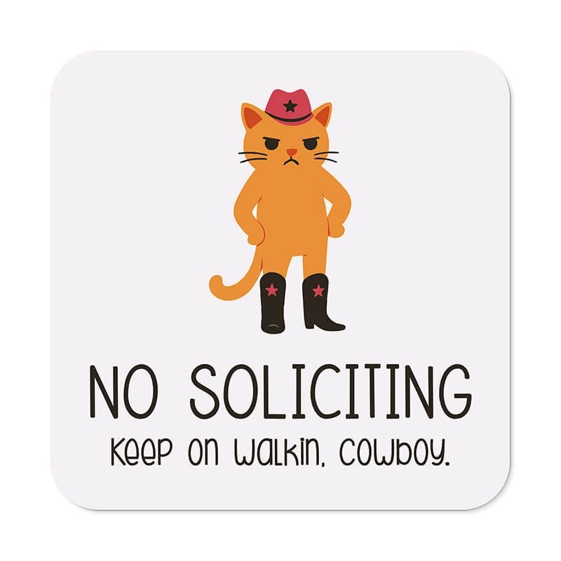 Cute orange frowning cat no soliciting sign that reads, “Keep on walkin, cowboy"